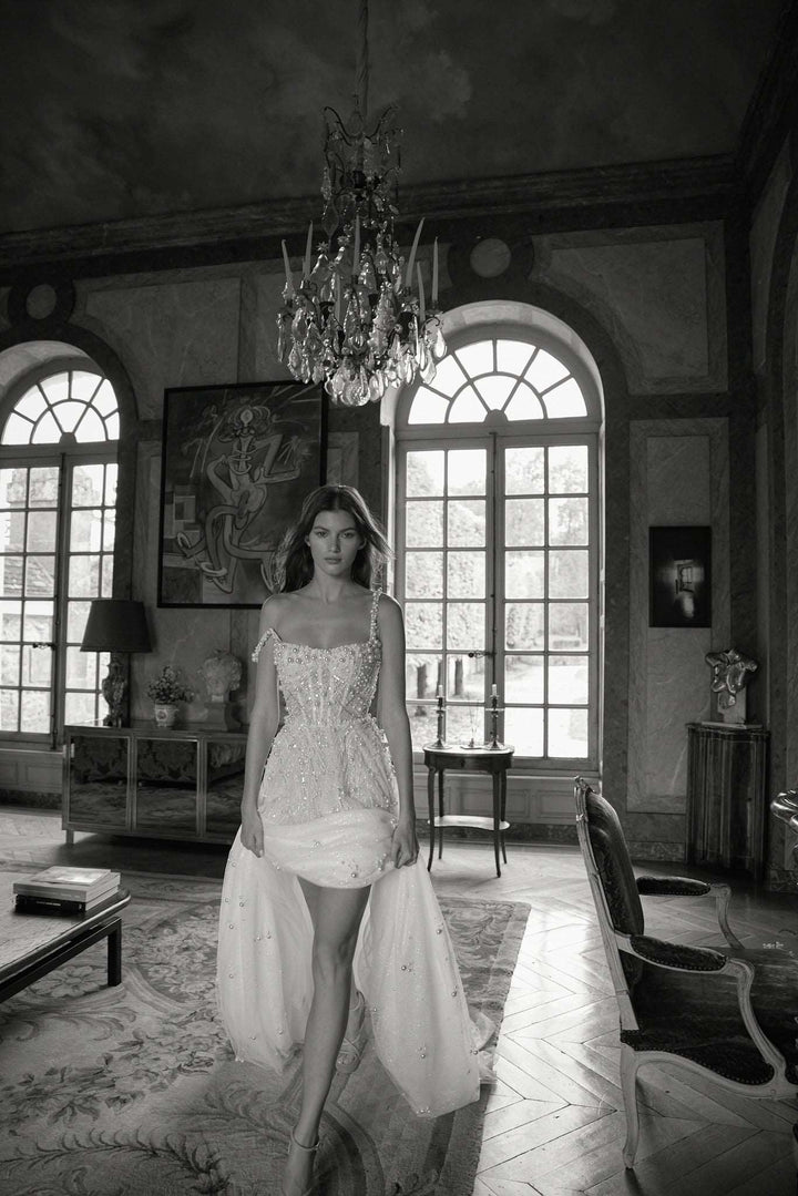 Iconic pearl wedding dress with youthful and modern square neckline made by Netta BenShabu available at Estrelle Bridal.