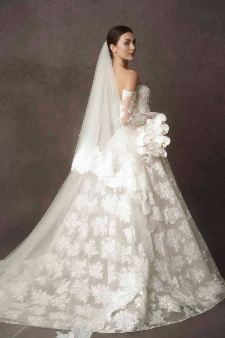 Exquisite lace beading wedding ballgown by Nicole Felicia Couture at Estrelle Bridal Toronto.