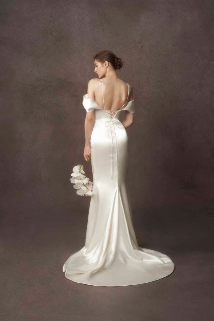 low back and thin strap charmeuse silk mermaid shape wedding dress by Nicole Felicia Couture at Estrelle Bridal